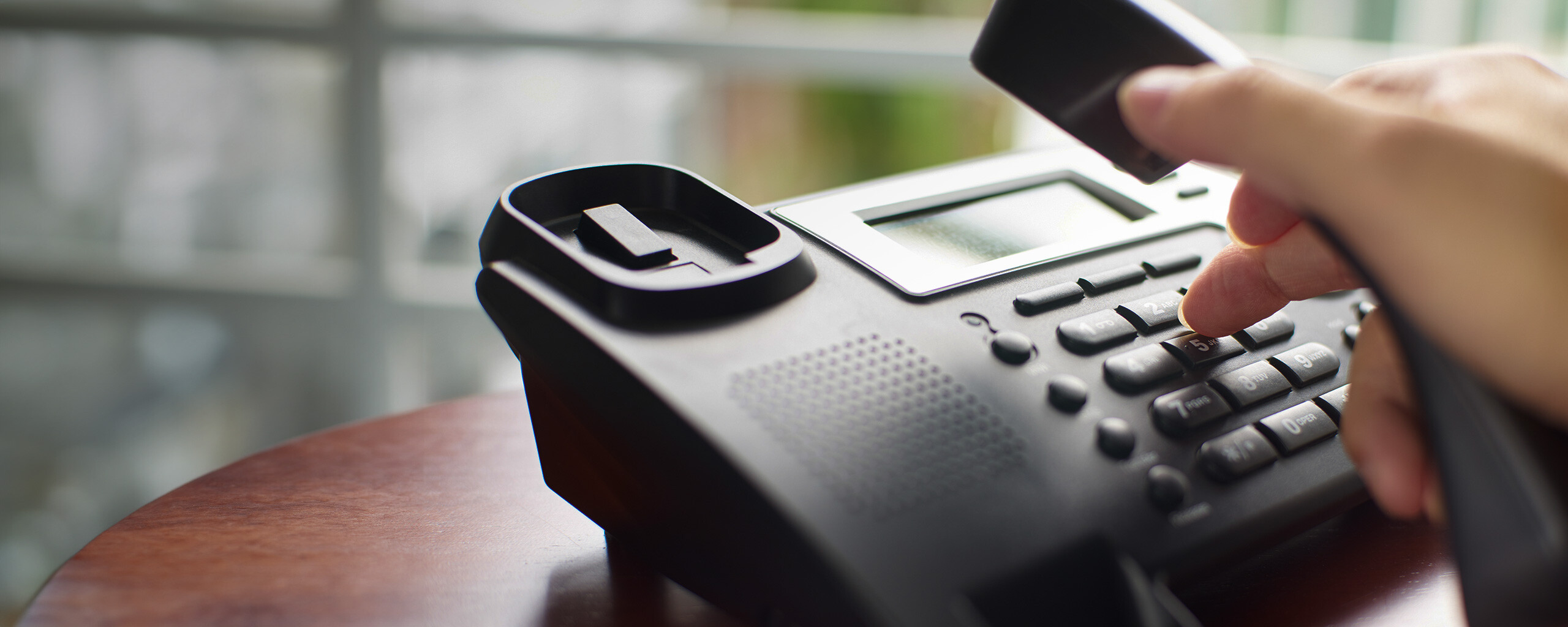Vindex, Sekretariatsleistungen, Bildinhalt Nahaufnahme Telefon